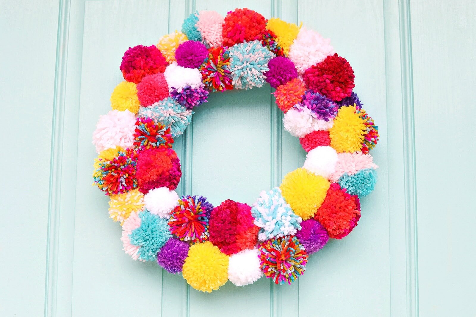 Crafty Home Decor: DIY Pom Pom Wreath For A Festive Touch